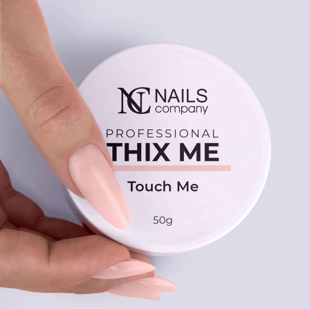 Thix Me Touch Me z kciukiem.webp